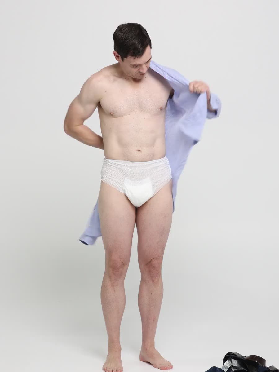 Carry On product demonstration showing a man getting dressed over pull-on underwear